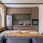 With Exposed Brick Interior - Stabu Street Апартаменти Рига
